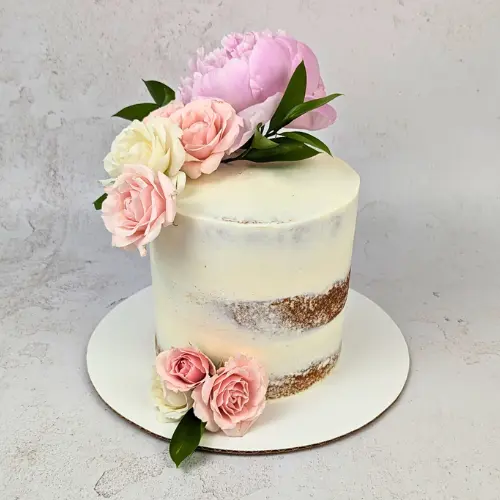 Naked cake with floral product image from Kakes and Kanvas